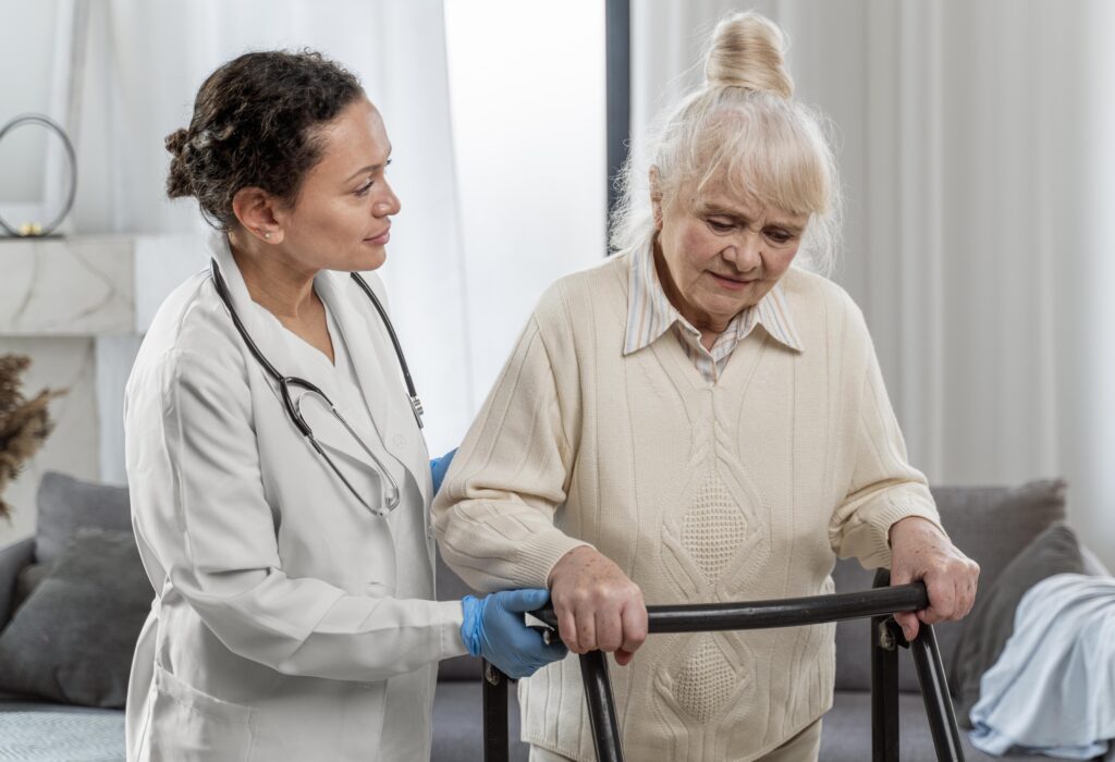 senior woman standing indoors doctor